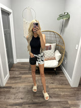 KIARA COW PRINT BLACK LEATHER SHORTS