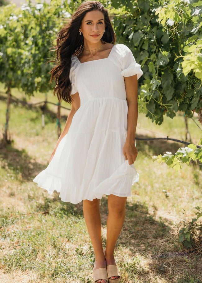 POPPY IN WHITE DRESS