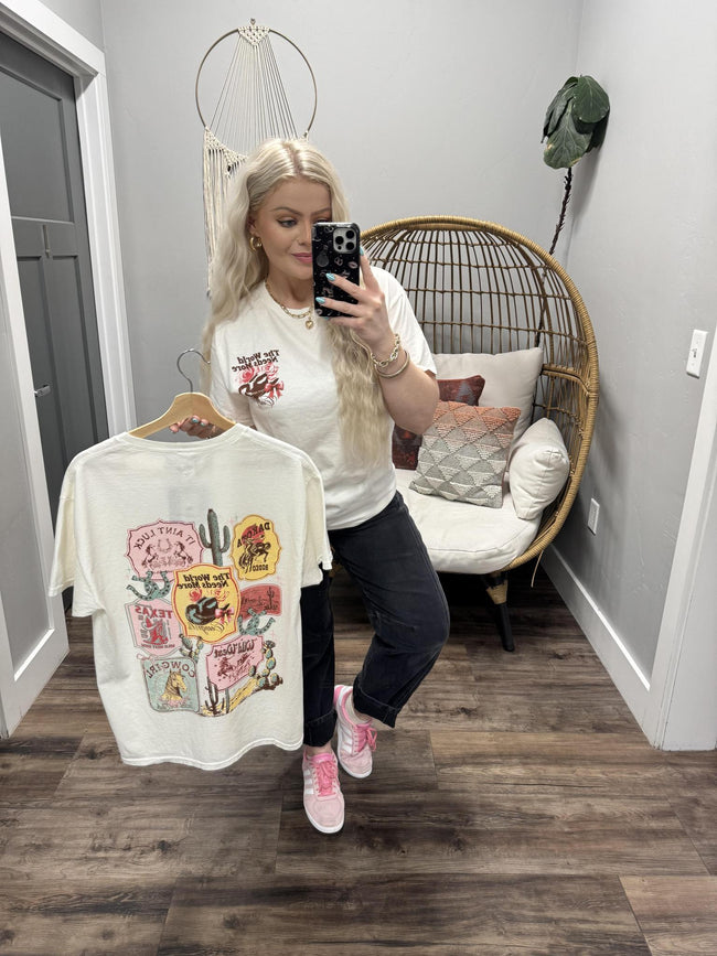 THE WORLD NEEDS MORE COWGIRLS GRAPHIC TEE
