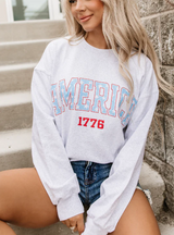CUE THE SPARKLERS SWEATSHIRT