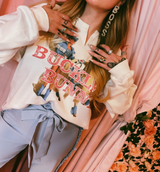 BUCKLE BUNNY CREW SWEATER