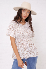 SMOCKED FLUTTER FLORAL BLOUSE