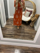 RUST MULTI FLORAL DRESS WITH TIE