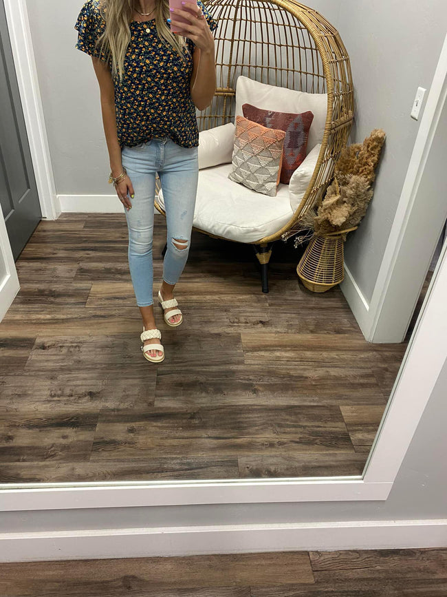 NAVY AND YELLOW FLORAL BUTTER SOFT RUFFLE TOP